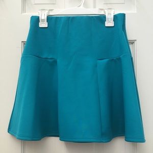 FLUTED SCUBA KNIT SKIRT